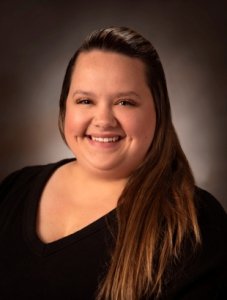Administrative Assistant Alex Osborne